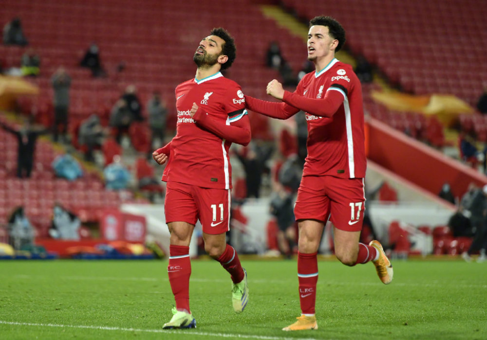  利物浦绝杀热刺登顶积分榜首